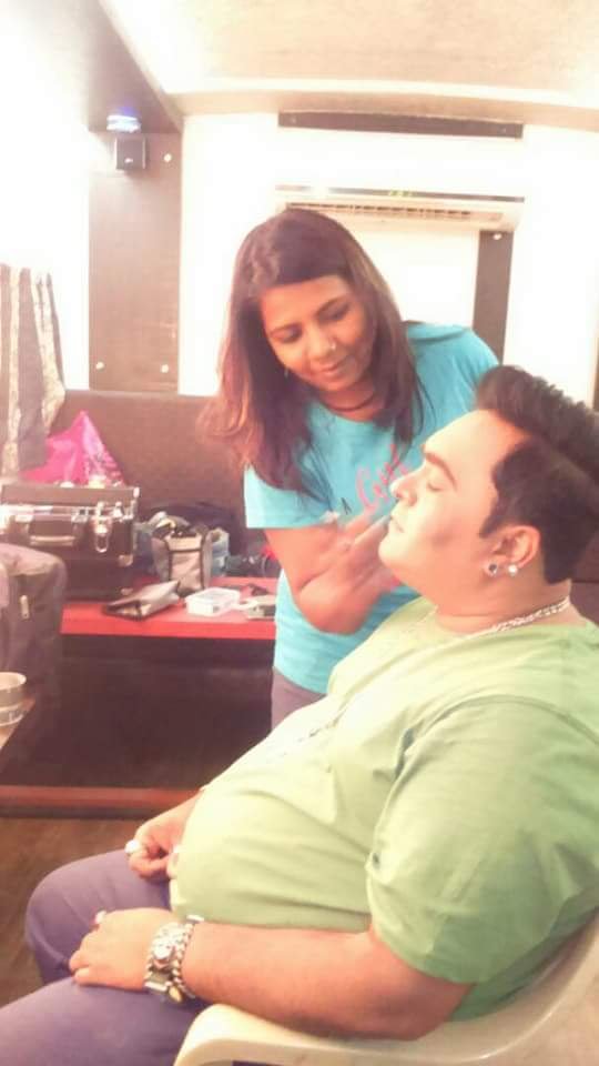 Grooming makeup being applied to a male client at Prayosha Salon & Academy